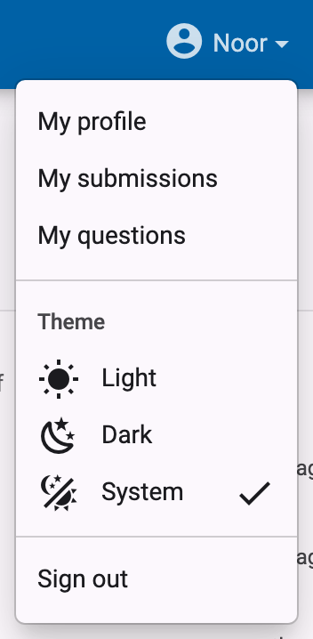 Open user menu with the Light, Dark and System options under the Theme heading